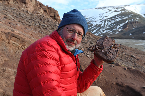 Neil Shubin with Tiktaalik Fossil. (Courtesy of Tangled Bank Studios, LLC)