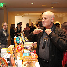 John Rael (left) at the book table with author David Brin (right)