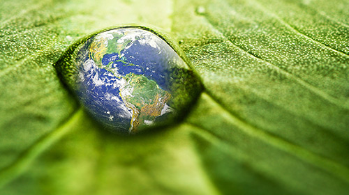 photo of Earth in a water droplet