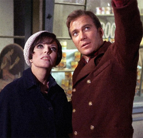 Joan Collins as Edith Keeler (left) and William Shatner as Captain James T. Kirk (right), in year 1930. Film still from the episode 'The City on the Edge of Forever.' (Credit: CBS)