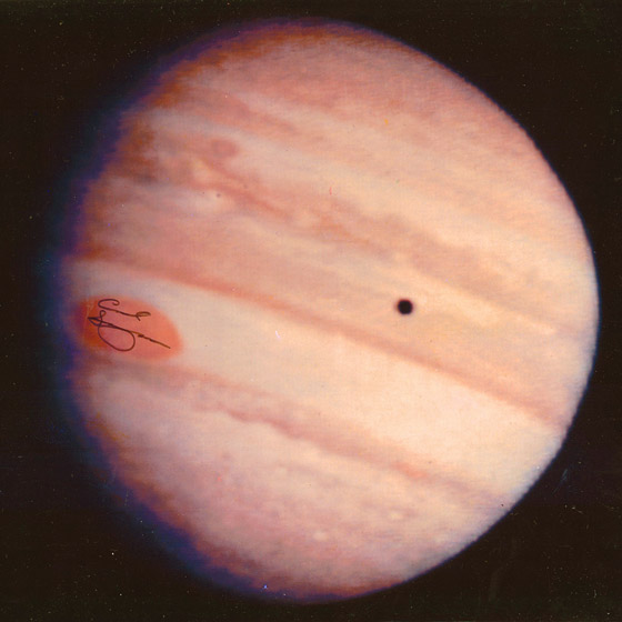 Jupiters red spot signed by Carl Sagan