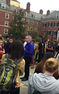 Yale college master Nicholas Christakis (in blue shirt) is verbally assaulted by a student who accused him of not doing enough to censor the wearing of Halloween costumes that could be seen as offensive. 'Who the fuck hired you?' the girl with the backpack screamed at the professor.