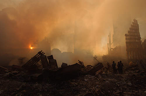 Sun streams over WTC wreckage (Photo by Andrea Booher/FEMA News Photo, taken on 09-13-2001. As works of the U.S. federal government, all FEMA images are in the public domain.)