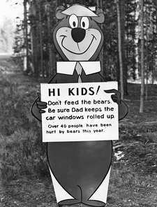 Yogi Bear with Don't Feed the Bears message (from the National Archives and Records Administration. This image is in the public domain, provided to Wikfile://localhost/Users/William/Skeptic/eSkeptic/eSkeptic%202012/eskeptic%202012-03-28/resources/MonsterTalk/Jacobs%20Creature/imedia Commons by the National Archives and Records Administration as part of a cooperation project. The National Archives and Records Administration provides images depicting American and global history which are public domain or licensed under a free license. It can be found here: http://commons.wikimedia.org/w/index.php?title=File:Yogi_Bear_with_%22don%27t_feed_the_bears%22_message_-_NARA_-_286013.tif&page=1