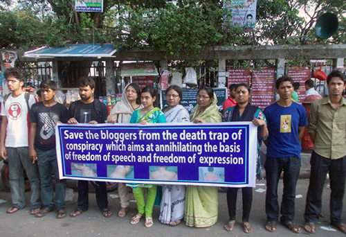 The activists and bloggers formed a human chain in front of Dhaka Press Club demanding release of four bloggers on May 2nd.