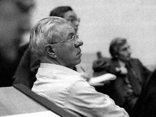 Fred Hoyle in the New Cavendish Lecture Hall, listening to a speaker, 1981.