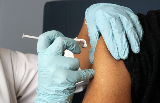 Nurse administers vaccine