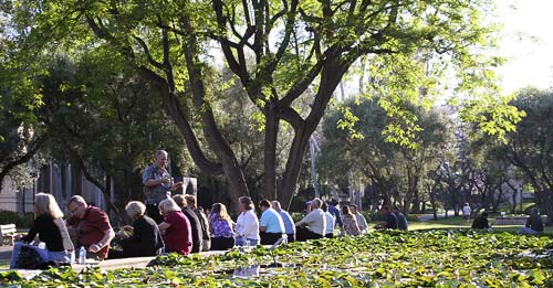 conference participants gather outside during a break